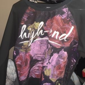 It has flowers in the middle that says high need in the middle